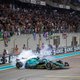 Sebastian Vettel doing donuts on the Yas Marina pit straight after his final F1 race